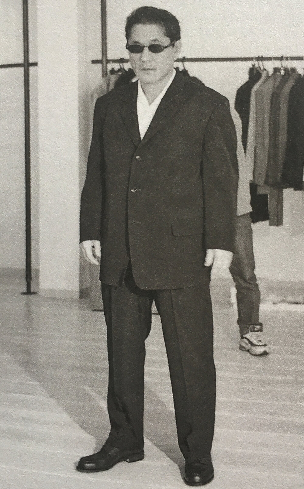 KITANO, Takeshi dir. During a fitting