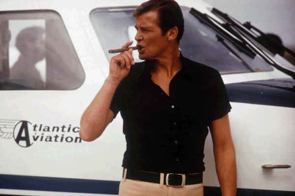 Roger-moore-in-black-silk-shirt