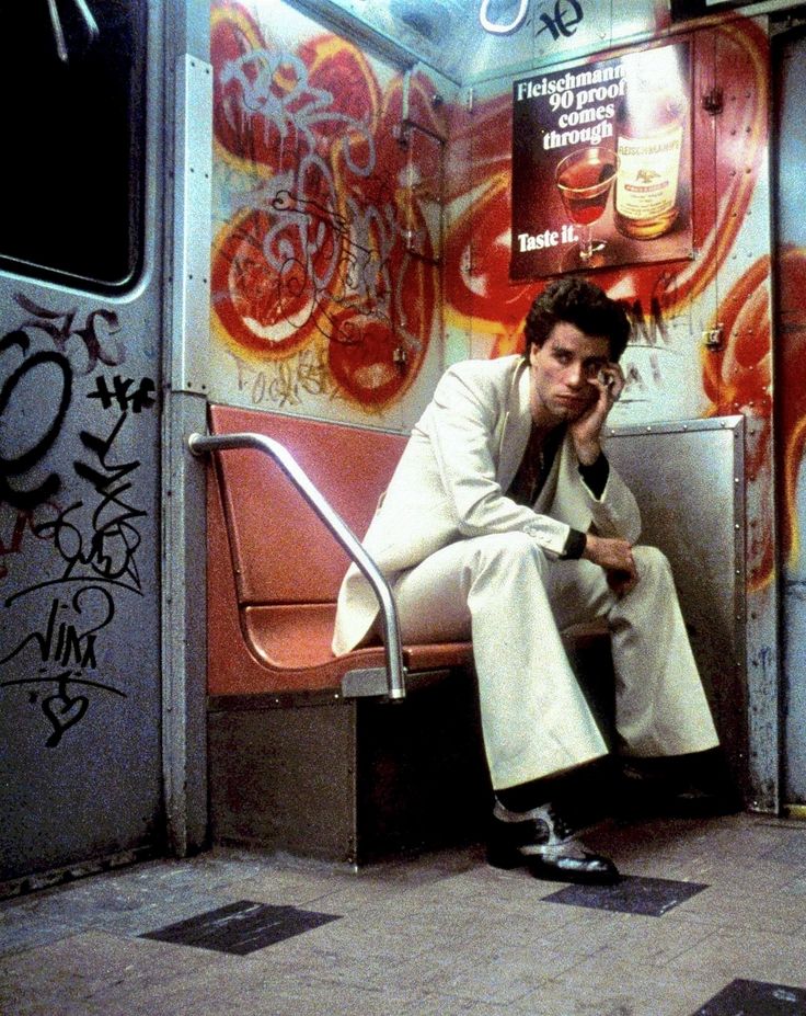 TRAVOLTA, John, act. BADHAM, John, dir. Saturday Night Fever, 1978